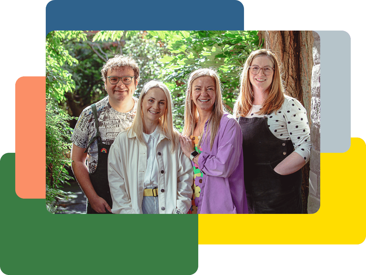 Connor, Jo, Katie, and Kim smiling together in front of 